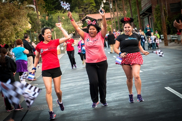 Women running and cheering in RunDisney Event
