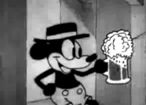 Mickey drinking a beer