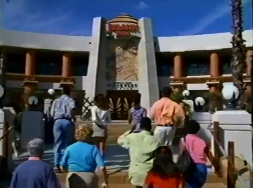Tourists approaching the Jurassic Park Discovery Center.