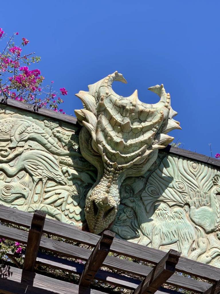 Dragon head carving over ticket booth