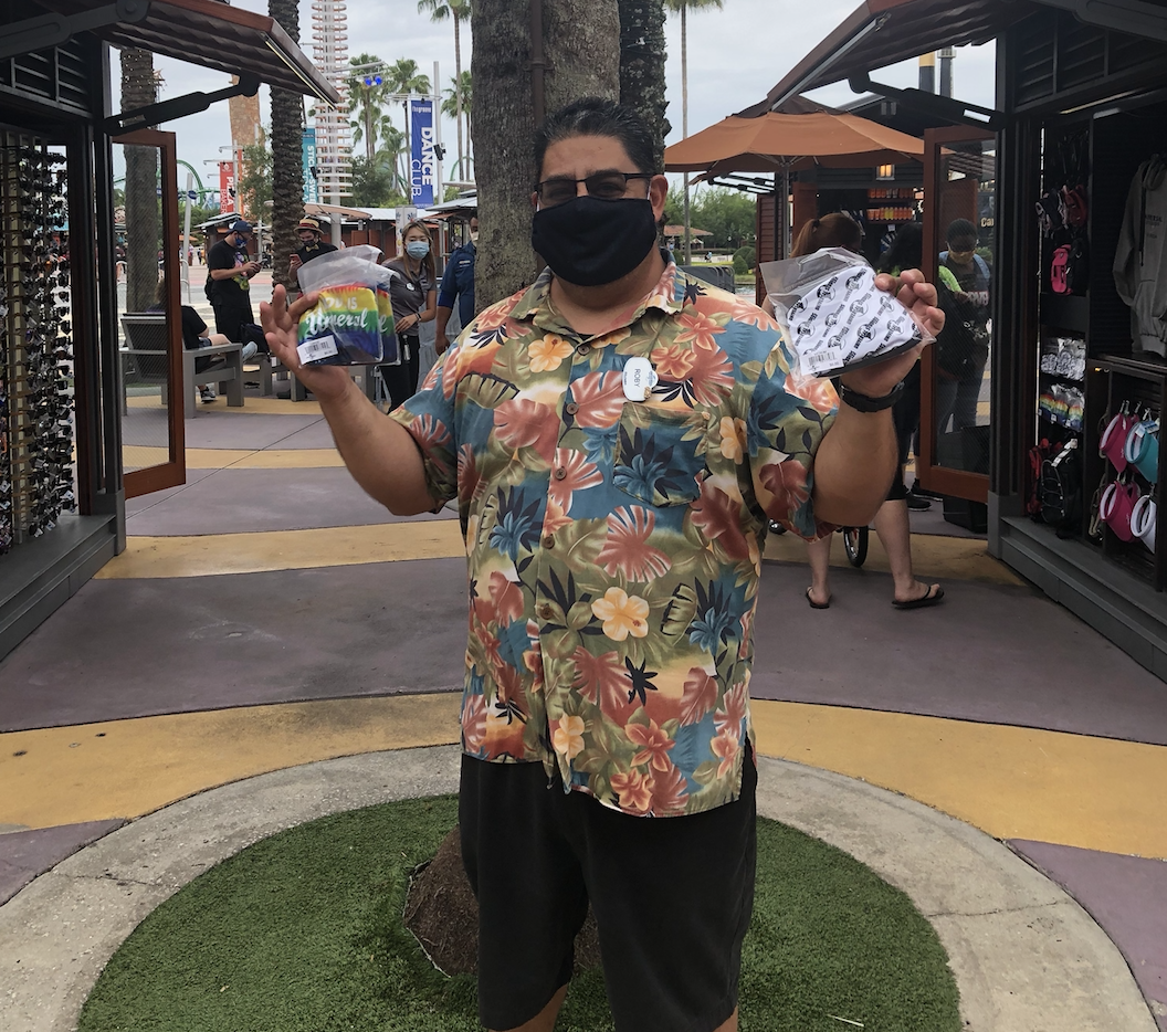 Universal employee selling branded face masks
