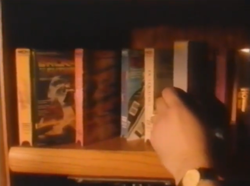 A shelf of VHS tapes at home
