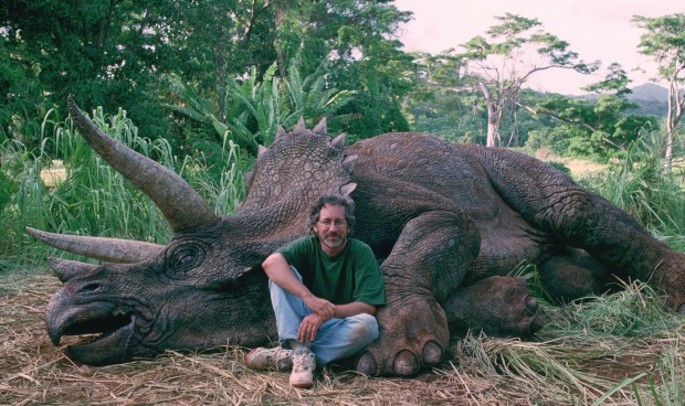 Steven Spielberg sitting beside the sick triceratops