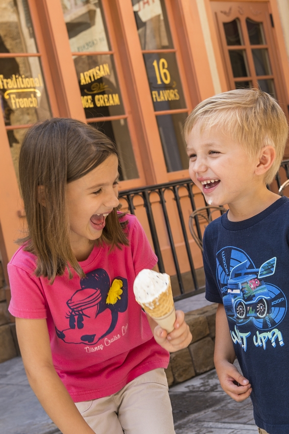 Boy and girl enjoying ice cream