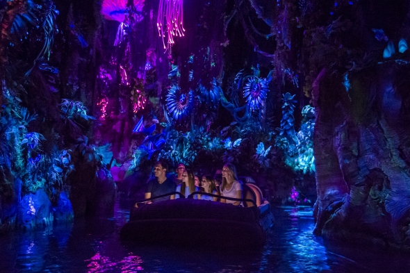 Navi River Journey boat surrounded by glowing trees