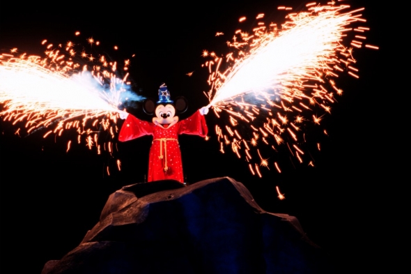 Sorcerer Mickey spraying fireworks