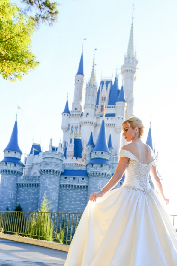 Beautiful bride in front of Cinderella Castle