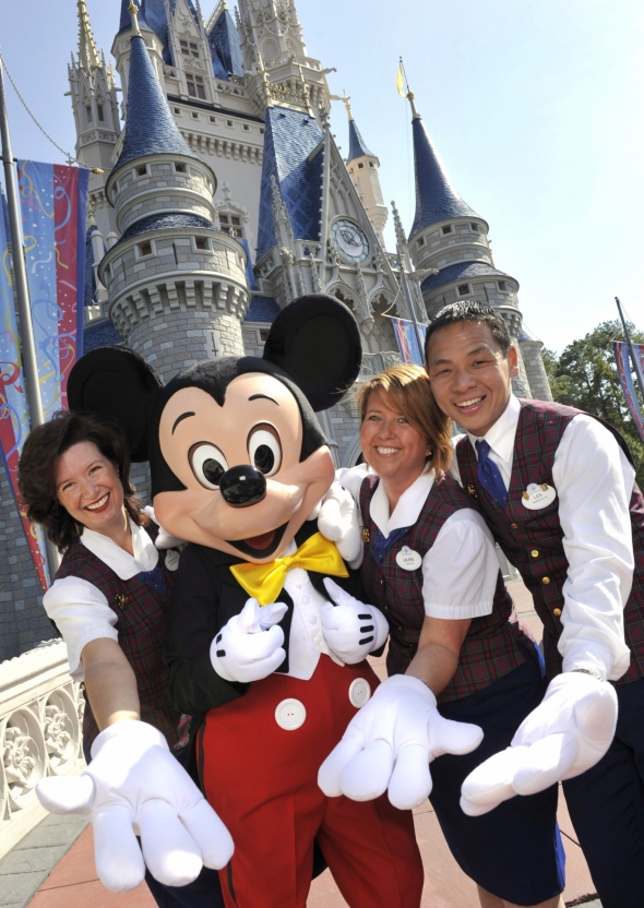 VIP Tour Guides in front of Cinderella Castle with Mickey