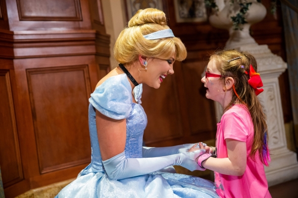 Adorable little girl meets Cinderella