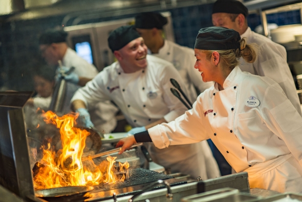 Chefs flambe-ing at the Flying Fish Cafe