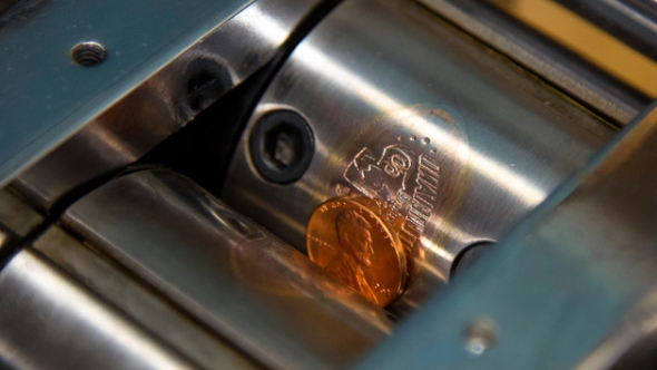 Pressed coin machine