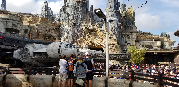 Millennium Falcon surrounded by crowds
